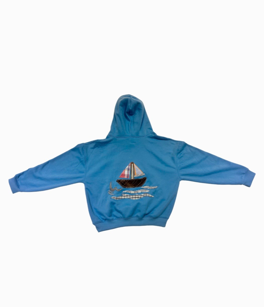 “LAYAG” in blue hoodie